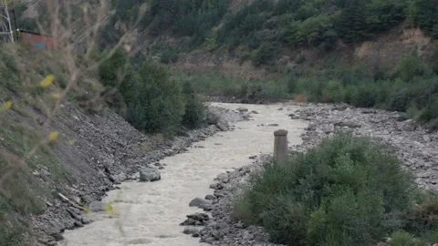 Fast-flowing mountain river Stock Footage 95240978