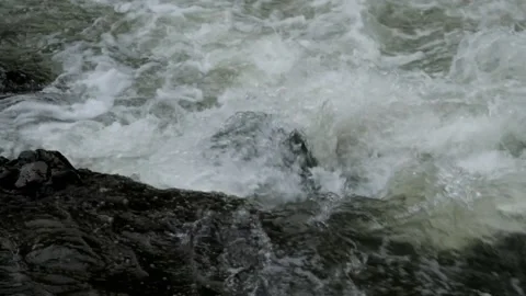 Fast flowing mountain river water 動画素材 297715447