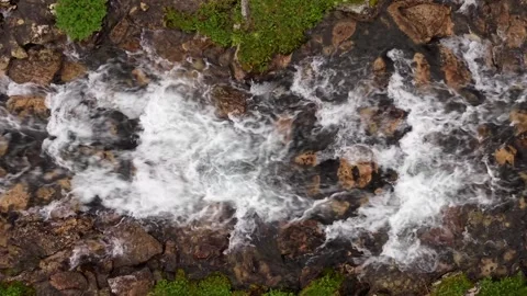 Fast flowing mountain stream and white water rapids Video stock 343937161