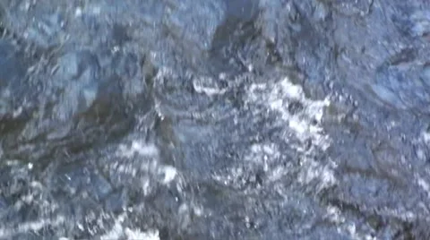 Fast flowing mountain stream close up Stock Footage 44334819