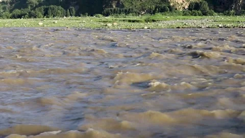 Fast flowing raging flood in river swat, Pakistan. Stock Footage 204128848