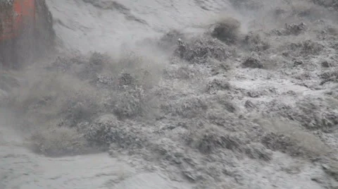 Fast flowing river during typhoon CU slow motion 1 Stock Footage 53366778
