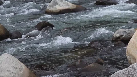 Fast flowing river having rocks in it. 스톡 동영상 148254306