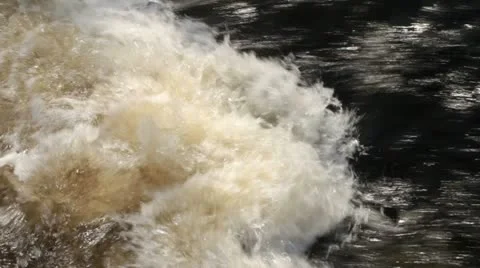 Fast flowing river making white water at rapids Stock Footage 10897102