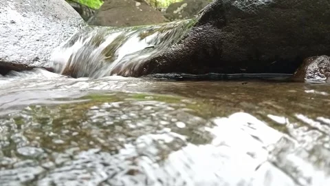 Fast Flowing River Over Rocks Close-Up | Clear Stream Water Motion Detail Stock Footage 330546317