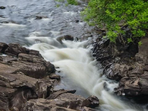 Fast flowing river Stock Photos