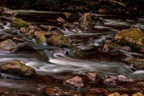 A fast flowing river Stock Photos
