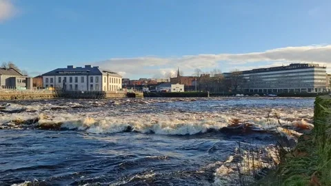 Fast Flowing River Rapids in Limerick City Ireland on Sunny Day Stock Footage 332507254