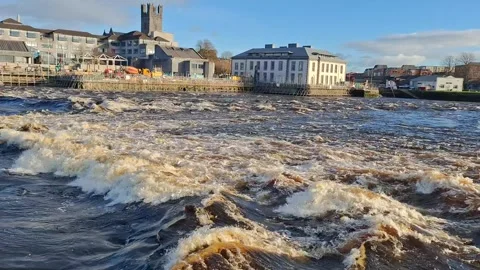 Fast Flowing River Rapids in Limerick City Ireland on Sunny Day Stock Footage 332507269
