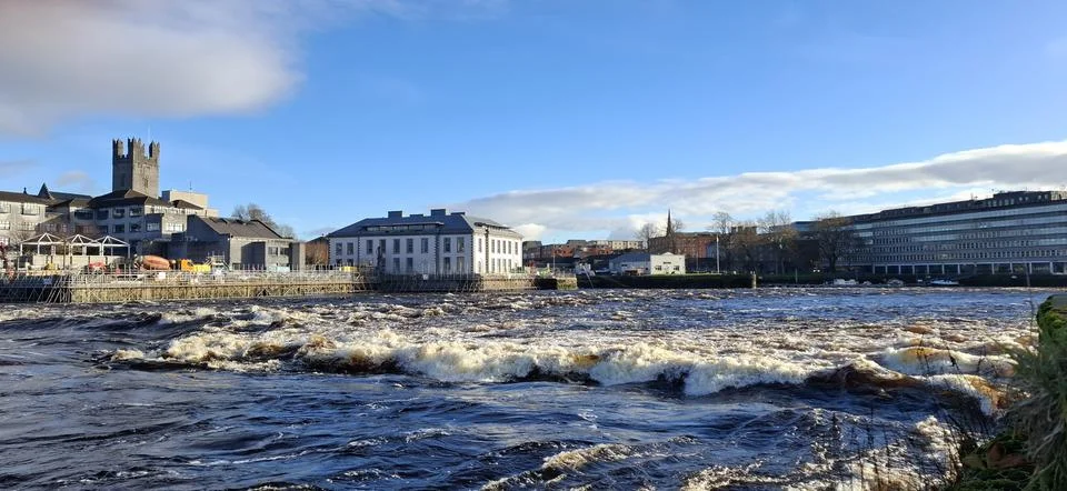 Fast Flowing River Rapids in Limerick City Ireland on Sunny Day Stock Photos