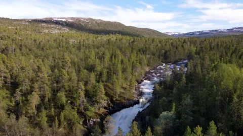 Fast flowing river before waterfall, Spring, Alta, 4K Drone Video stock 146755150