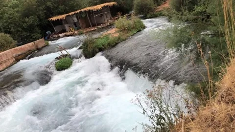 Fast Flowing River Waterfall with Strong Current Natural Scene Stock Footage 331103536