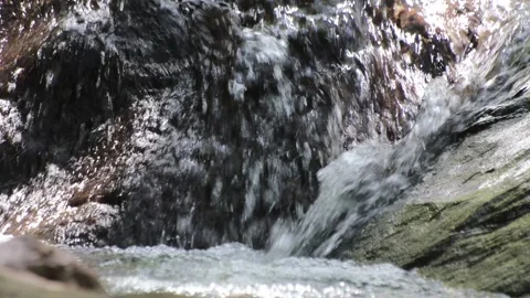 Fast flowing stream Stock Footage 303435734