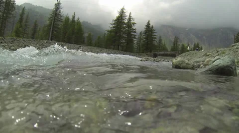 Fast Flowing Stream Surrounded by Mountainous Environment 2 動画素材 28498880