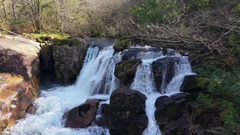 Fast-flowing Streams Of Fervenza Da Noveira Waterfall Stock-Footage 334999760