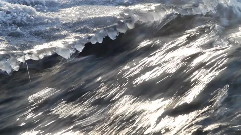 Fast flowing water and the edge of ice Stock Footage 149090058