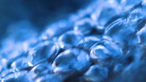 Fast flowing of water bubbles Stock Footage 124076255