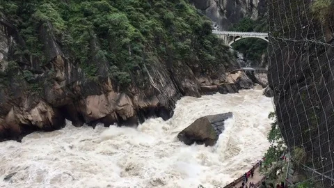 The fast-flowing water in the tiger leaping gorge Stock Footage 82120490