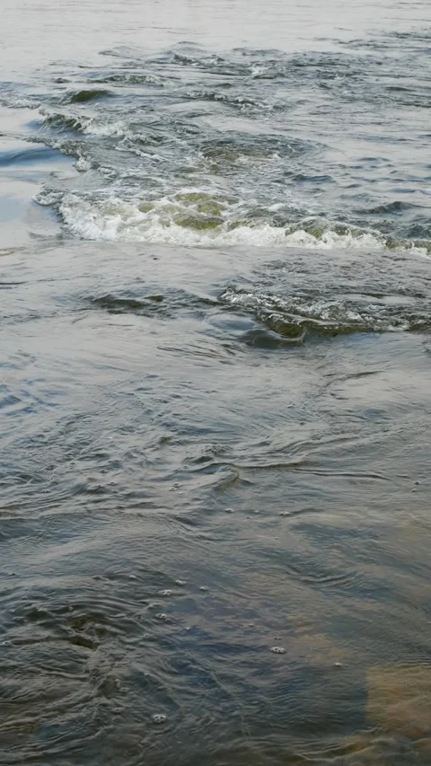 Fast flowing water of a wide river Stock Footage 255892634