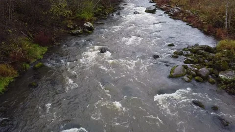 Fast flowing waters of mountain river and smooth rock. Stock Footage 142158976