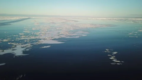 Fast fly around snow patterned ice Stock-Footage 86673599