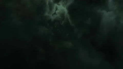 Fast Fly Through Dark Grey Clouds with Lightnings. Evil Background. Infinite Stock Footage 217657919