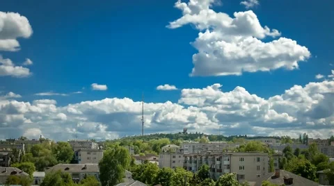 Fast flying clouds above the city Stock Footage 50259982