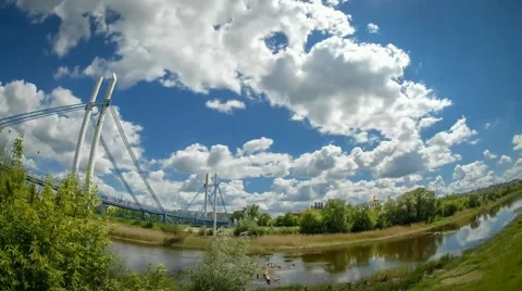 Fast flying clouds above the river, Timelapse Clouds Stock Footage 50259941