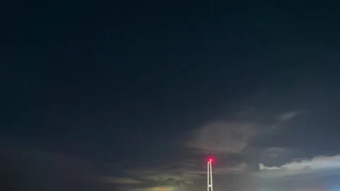 Fast flying clouds in the night starry sky Stock Footage 142124549