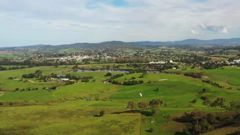Fast flying over Bega valley green cultivated agriculture dairy milk farms –4k Stock Footage 189848753