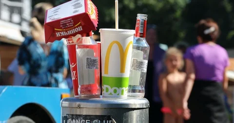 Fast Food And Drinks Packaging On A Stainless Steel Bollard Stock Footage 114460951