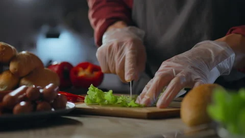 Fast food. Creative chef uses professional skills cutting green salad in ind Stock Footage 277162731