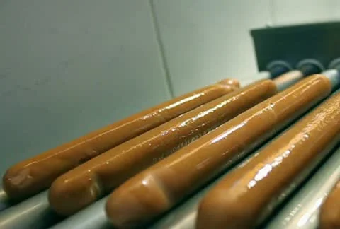 Fast Food Hotdogs turning on Grill NTSC SD Stock Footage