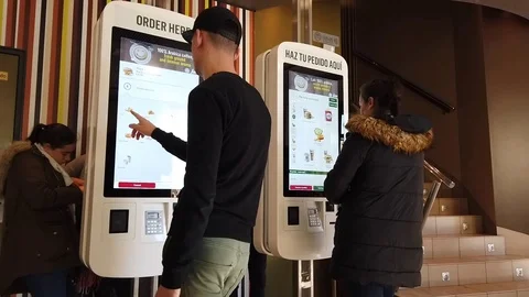 Fast Food Ordering from a Kiosk Stock Footage 101010933