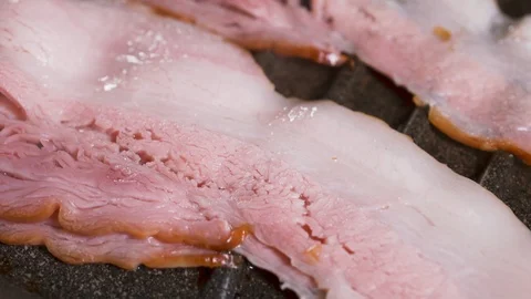 Fast food restaurant concept: Bacon on the frying pan, cooking the meat Stockbeeldmateriaal 111222853