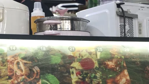 Fast food restaurant menu with working chef Stock Footage 314062194