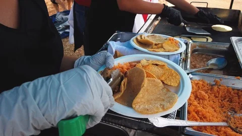 Fast food soft shell tacos being served for customer on a plate Video stock 116697302