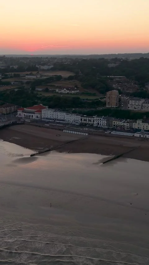 Fast Forward Aerial Flight Over the Sea Toward Hastings Pier at Sunset Stock Footage 342235591