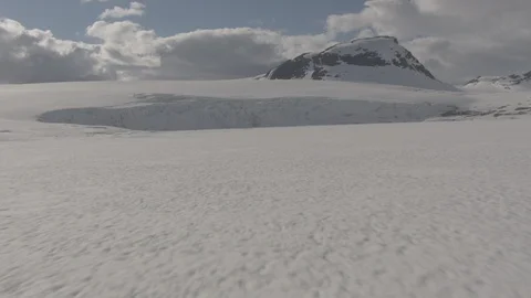 Fast forward aerial view of glacier in Norway Stock Footage 87726784