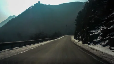 Fast forward of driving down the mountain road Видео 35856844