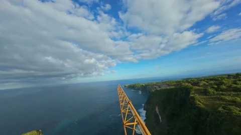 Fast FPV Drone Flight Along Construction Crane At Kelingking Beach, First Person Stock Footage 336633648