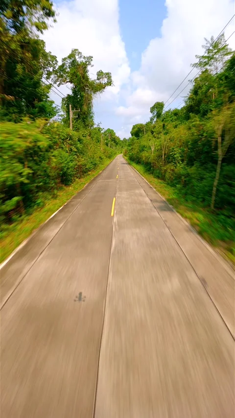 Fast FPV drone flight over tropical road in Thailand. Stock Footage 263392547