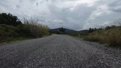 Fast FPV Drone Flight Over Mountain Road - Low Altitude 4K Stock Footage 331747681
