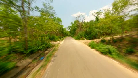 Fast FPV Flight Over The Road Through Green Forest In Summer, Thailand Stock Footage 297187514