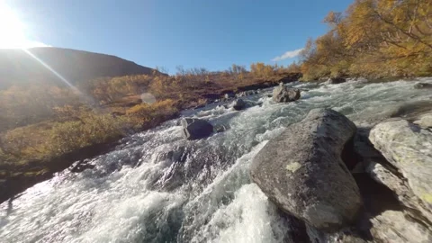 Fast Fpv Flying Up a mountain stream in Norway Stock Footage 169154287