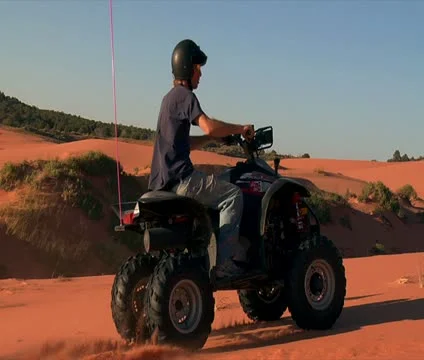 Fast high shutter speed ATV rider Stock Footage 21635917