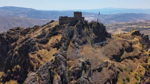 Fast Horizontal Aerial Pullback from Ancient Stone Fortress Stock Footage 339634510