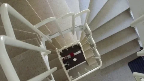 Fast hyper timelapse pov move at spiral stairs down Stock Footage 77214318