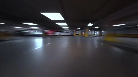 Fast hyperlapse drive through an underground mall parking garage with strong Stock-Footage 324728651