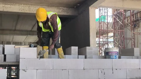 Fast Installation of Lightweight AAC Blocks for Building Walls Stock Footage 332787672